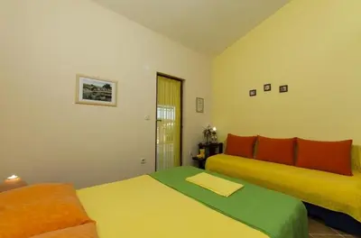 Krevet ili kreveti u jedinici u objektu Studio Apartment in Ražanj with Sea View, Terrace, Air Conditioning, Wi-Fi (4597-3)