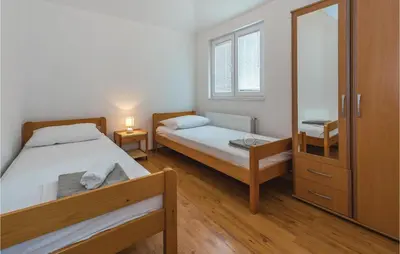 Krevet ili kreveti u jedinici u objektu 9 Bedroom Nice Home In Tribunj