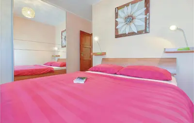 Krevet ili kreveti u jedinici u objektu Three-Bedroom Holiday Home In Sibenik