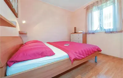 Krevet ili kreveti u jedinici u objektu Three-Bedroom Holiday Home In Sibenik