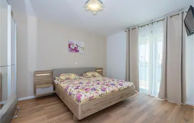 Krevet ili kreveti u jedinici u objektu Four-Bedroom Holiday Home In Sibenik