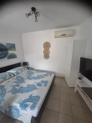 Krevet ili kreveti u jedinici u objektu Apartments Valentina Tisno