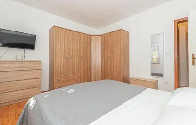 Krevet ili kreveti u jedinici u objektu One-Bedroom Holiday Home In Bilice