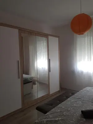 Krevet ili kreveti u jedinici u objektu Apartmani Milutin