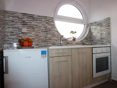 Kuhinja ili čajna kuhinja u objektu Apartmani Slavica