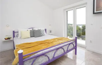 Krevet ili kreveti u jedinici u objektu Seven-Bedroom Holiday Home In Zaboric