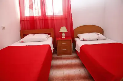 Krevet ili kreveti u jedinici u objektu Apartments with parking space Vodice - 16190