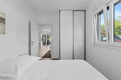 Krevet ili kreveti u jedinici u objektu Apartment Moments Rogoznica