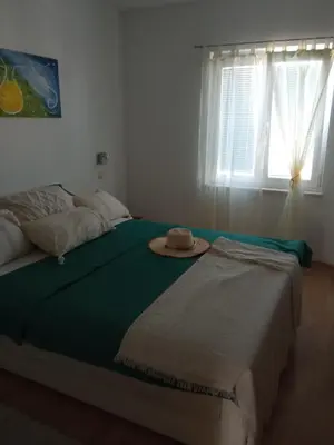 Krevet ili kreveti u jedinici u objektu Apartments Tomić