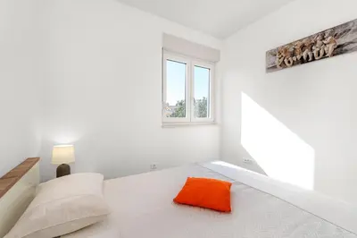 Krevet ili kreveti u jedinici u objektu Apartments Boomerang