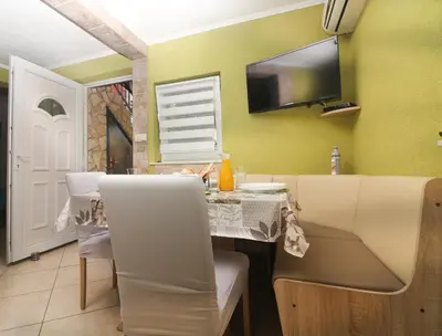 TV i/ili zabavni centar u objektu Apartmani Galešić
