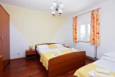 Krevet ili kreveti u jedinici u objektu Apartments with parking space Vodice - 16543