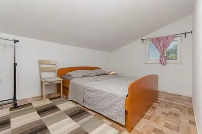 Krevet ili kreveti u jedinici u objektu Apartments Snjezana