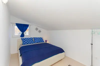 Krevet ili kreveti u jedinici u objektu Apartments Snjezana