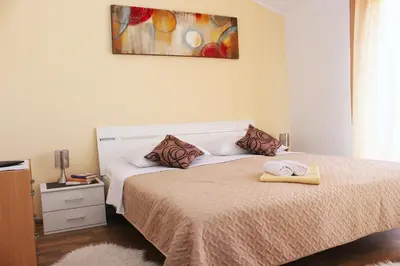 Krevet ili kreveti u jedinici u objektu Apartments & Rooms Milena