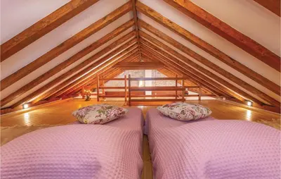 Krevet ili kreveti u jedinici u objektu Two-Bedroom Holiday Home In Pakovo Selo