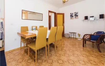 TV i/ili zabavni centar u objektu Four-Bedroom Holiday Home In Zaboric