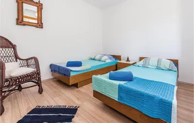 Krevet ili kreveti u jedinici u objektu Four-Bedroom Holiday Home In Zaboric