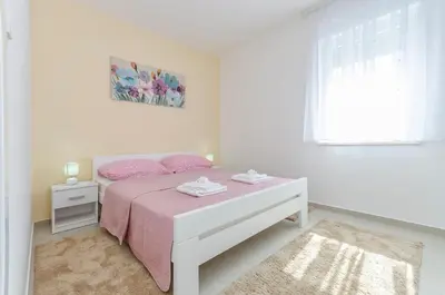 Krevet ili kreveti u jedinici u objektu Apartments Luxury and Sea View