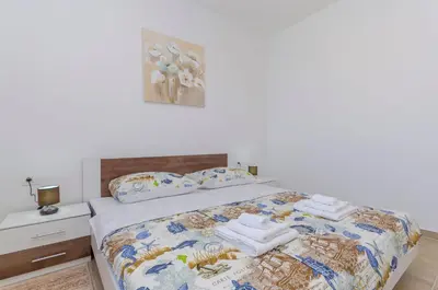 Krevet ili kreveti u jedinici u objektu Apartments Luxury and Sea View
