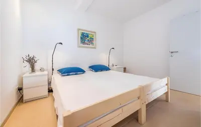 Krevet ili kreveti u jedinici u objektu Two-Bedroom Apartment In Murter