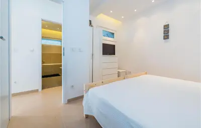 Krevet ili kreveti u jedinici u objektu Two-Bedroom Apartment In Murter