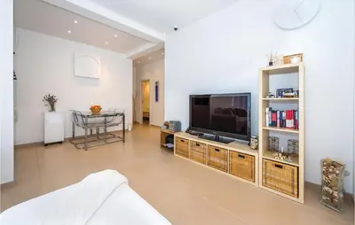 TV i/ili zabavni centar u objektu Two-Bedroom Apartment In Murter