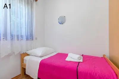 Krevet ili kreveti u jedinici u objektu Apartments Klaric