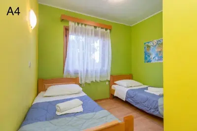 Krevet ili kreveti u jedinici u objektu Apartments Klaric