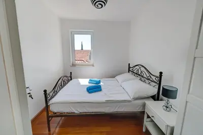 Krevet ili kreveti u jedinici u objektu Family-friendly apartments with swimming pool Murter - 16655