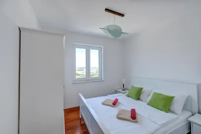 Krevet ili kreveti u jedinici u objektu Family-friendly apartments with swimming pool Murter - 16655