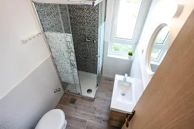 Kupaonica u objektu Apartments Rajna