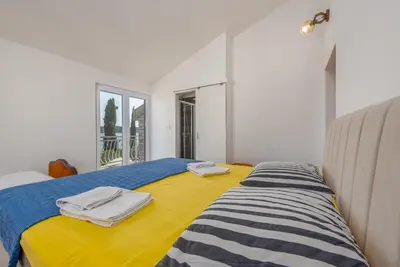 Krevet ili kreveti u jedinici u objektu Villa On The Beach