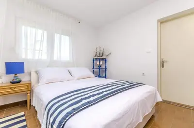 Krevet ili kreveti u jedinici u objektu Apartments Marin