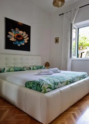 Krevet ili kreveti u jedinici u objektu Glorianita sweethome,centro, FREE parking,SELF CHECK- IN