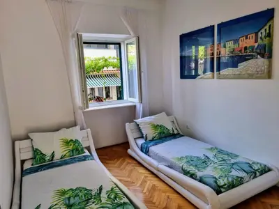 Krevet ili kreveti u jedinici u objektu Glorianita sweethome,centro, FREE parking,SELF CHECK- IN