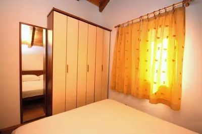 Krevet ili kreveti u jedinici u objektu Apartments Dragan