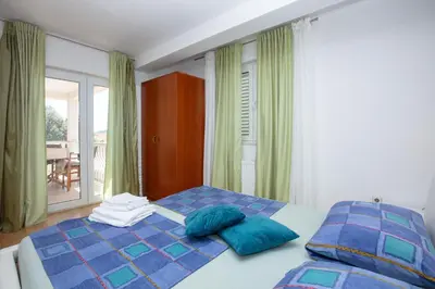 Krevet ili kreveti u jedinici u objektu Apartment Rogoznica 17129b