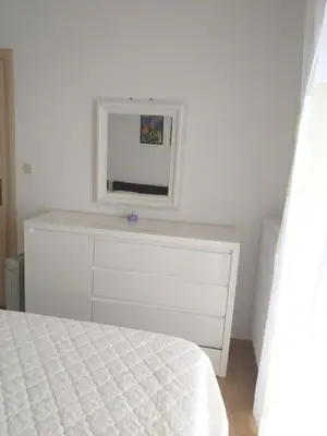 Krevet ili kreveti u jedinici u objektu Apartmani Ivan by the sea