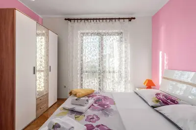 Krevet ili kreveti u jedinici u objektu Family Apartments Barbarella