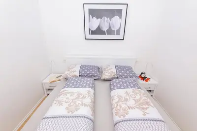 Krevet ili kreveti u jedinici u objektu Elegant Apartment Šibenik Center with Balcony & Private Parking