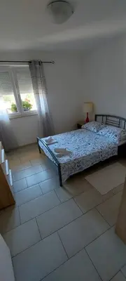 Krevet ili kreveti u jedinici u objektu Apartmani Ivišić