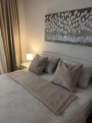 Krevet ili kreveti u jedinici u objektu Apartment & Rooms Riva