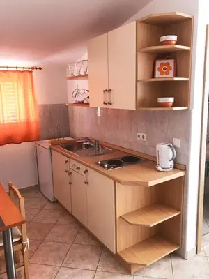 Kuhinja ili čajna kuhinja u objektu Apartment & Rooms Riva
