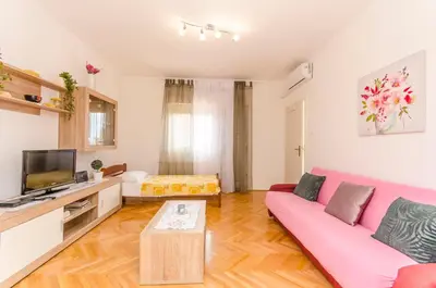 TV i/ili zabavni centar u objektu Apartment Sime