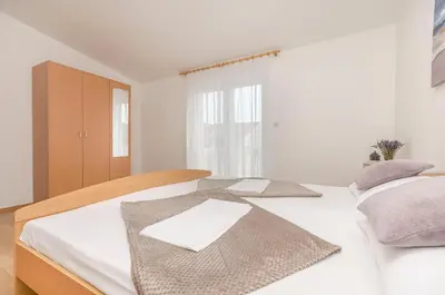 Krevet ili kreveti u jedinici u objektu Apartments Sabina