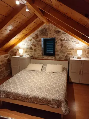 Krevet ili kreveti u jedinici u objektu Krka Waterfalls Stonehouse Roko