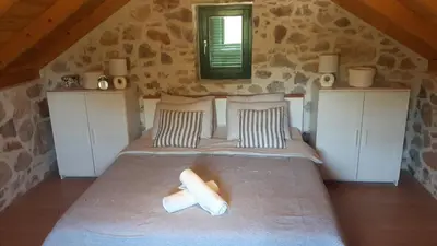 Krevet ili kreveti u jedinici u objektu Krka Waterfalls Stonehouse Roko