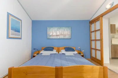 Krevet ili kreveti u jedinici u objektu Apartments Sunset beach