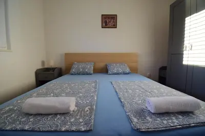 Krevet ili kreveti u jedinici u objektu Apartmani Barba